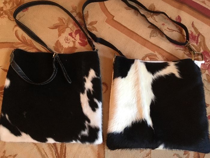 Cool cow bags for a cause. These 14 x 16 inch messenger bags are created cow hair on skin cow hide on the front and leather backs. The straps are repurposed leather and hardware. A portion of each bag helps to support an Evanston high school  scholar with her dream to attend college.