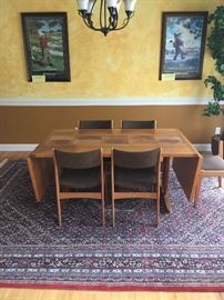 Dining table with ceramic tile inserts