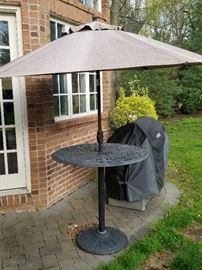 outside table with umbrella stand