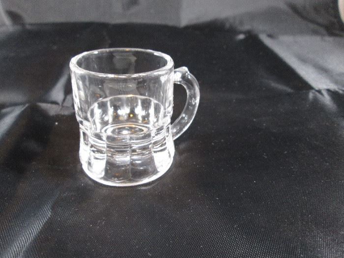  Miniature beer mug       http://www.ctonlineauctions.com/detail.asp?id=704501