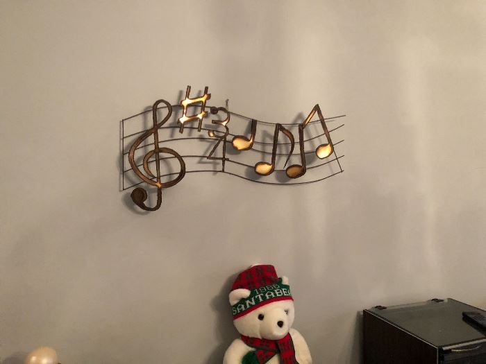 Hang it above the piano?
