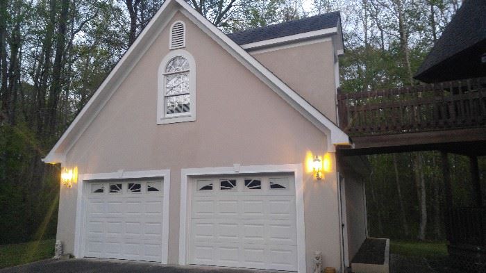 Beautiful two-car garage with man cave upstairs