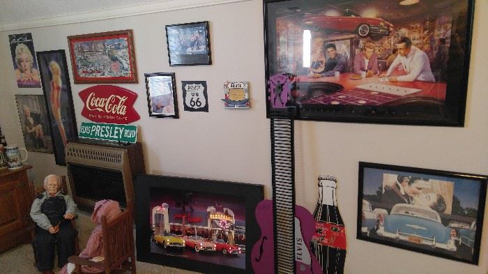 Man cave above the garage has the coolest Collectibles ever!
Elvis Presley* Marilyn Monroe* James Dean NASCAR* collectible cars* signs *Coca-Cola *beer signs