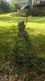 Southern belle statue ready for clematis or other climbing plants to make a beautiful skirt