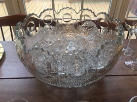 Lead cut crystal punch bowl with 12 cups. 