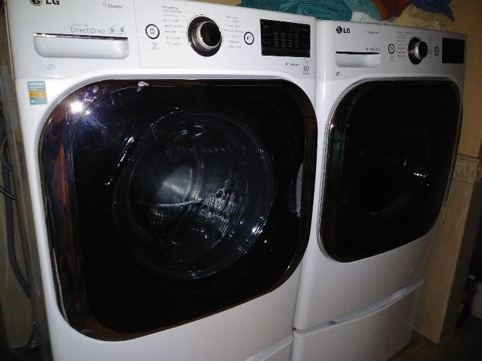 LG True Steam front load washer and dryer set w/base