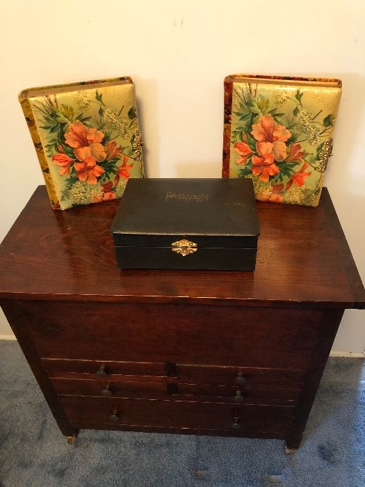 Interesting wooden chest, as lid lifts with three divided drawers. Antique photo albums