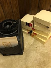 In need of an old slide projector?  With spare cartridges 