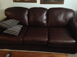 2 identical leather sofas