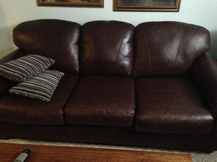 2 identical leather sofas 