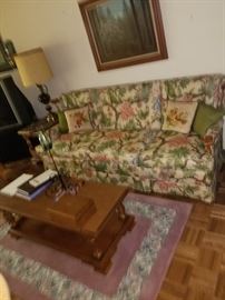 Floral print sofa.  The coffee table is Tell City Furniture 