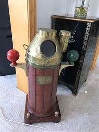 A binnacle containing a ships standard compass.