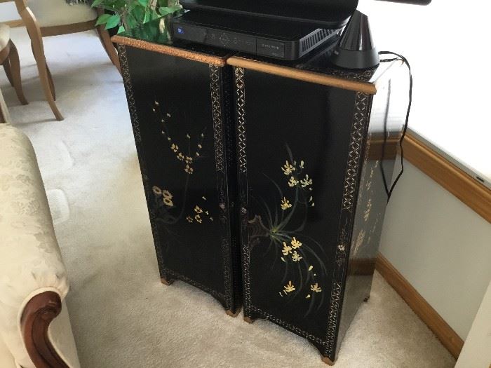 Pr of black lacquer plant stands that are used here as a TV Stand