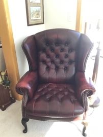 Burgandy/brown leather wing back chair