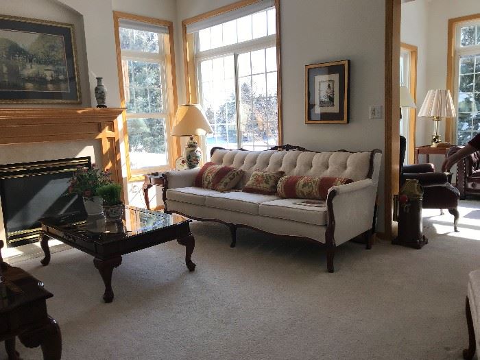 End tables, coffee table, pillows, pictures, lamps and decorative items