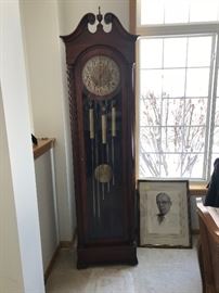 Colonial Grandfather clock in non working condition, Circa 1920. This clock has a wonderful tone