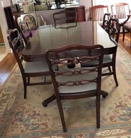 beautiful mahogany finding room table with 6 chairs, buffet, & hutch