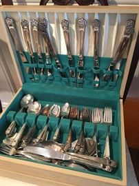 Two sets of flatware 