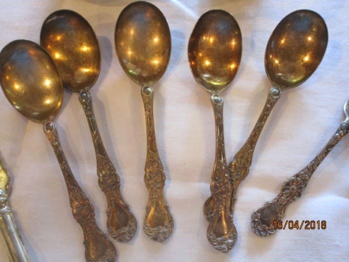 ornate silverplate spoons