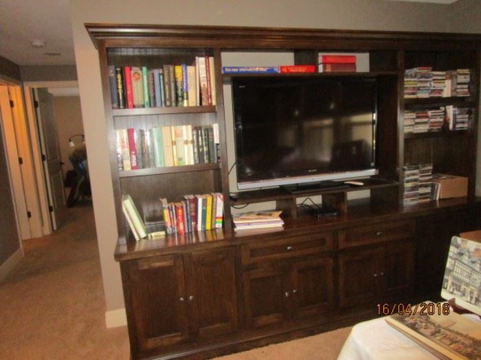 Hand-crafted credendza bookcase/tv stand about 9' long.  Also lots of books and cds and a 46" Sony TV