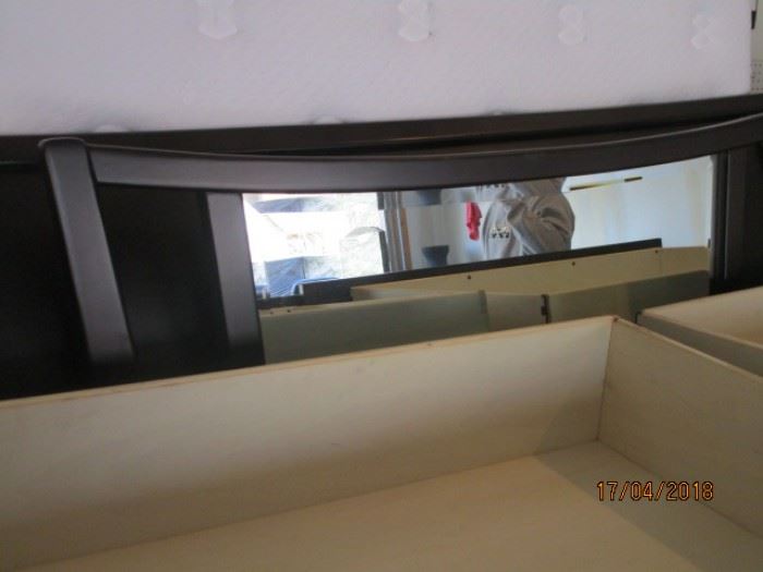 Aspenhome dresser mirror in front of Aspenhome headboard