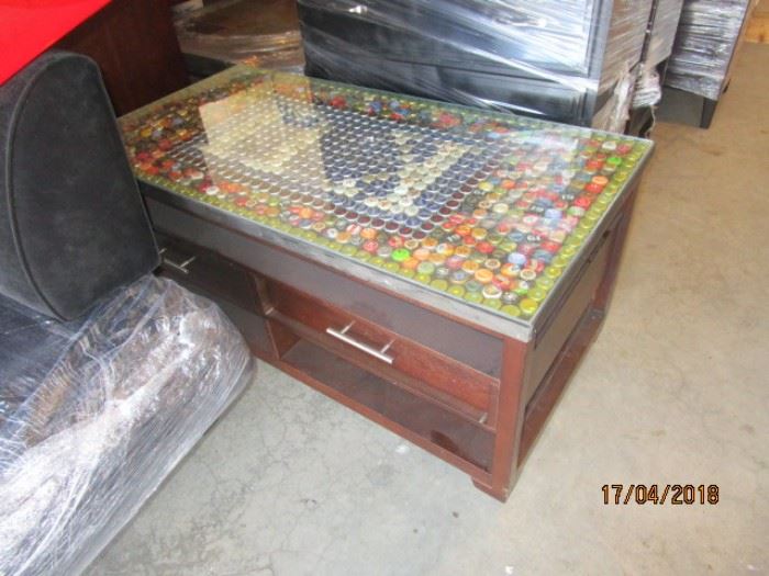 Coffee table with bottle caps inlay
