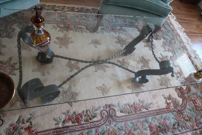 Iron and glass coffee table.