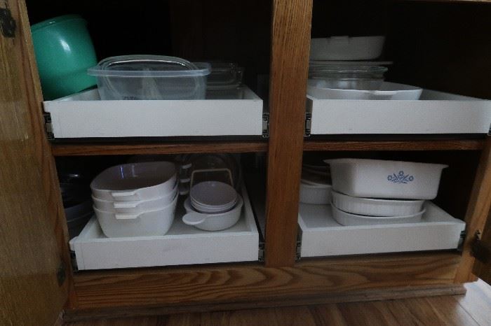 Lots of Corning ware.  LOTS!  Plus stands, trays, heating plates and handles for them!