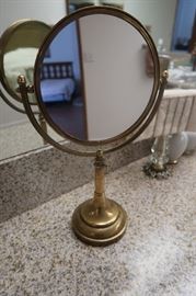 Brass mirror.