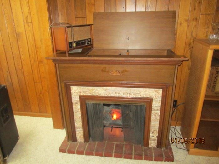 Ward's console turn table, 8 trac, and turntable with lighted fireplace