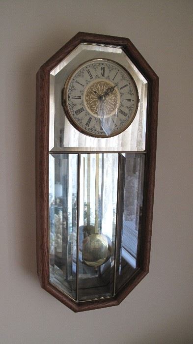 Mirrored wall clock.