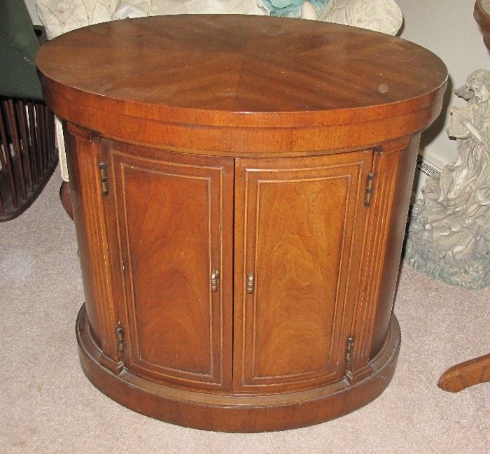Quality oval two door cabinet.