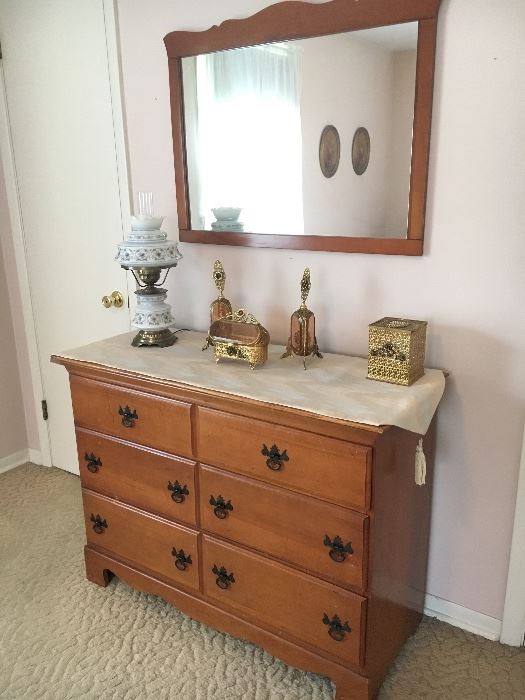 Vintage maple dresser and hanging mirror.