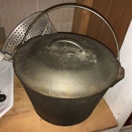 Antique footed cast iron dutch oven.