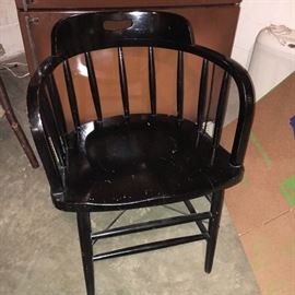 Pair two Windsor-style chairs painted black.