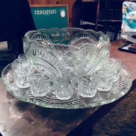 Huge vintage pressed glass punch bowl with under plate and cups.