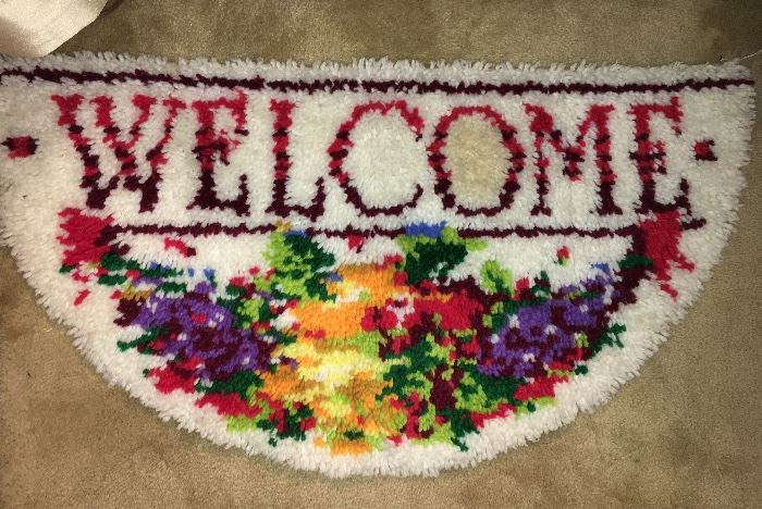 Vintage DIY hooked welcome rug. Don't you feel welcome?