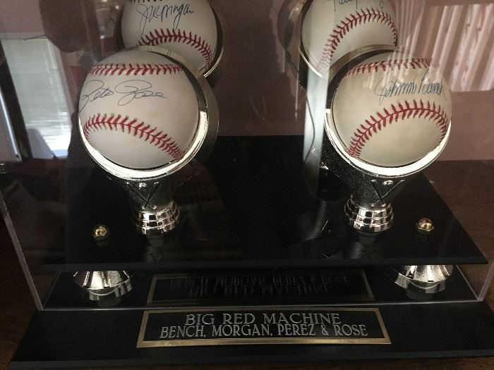 Autographed baseballs in protective case