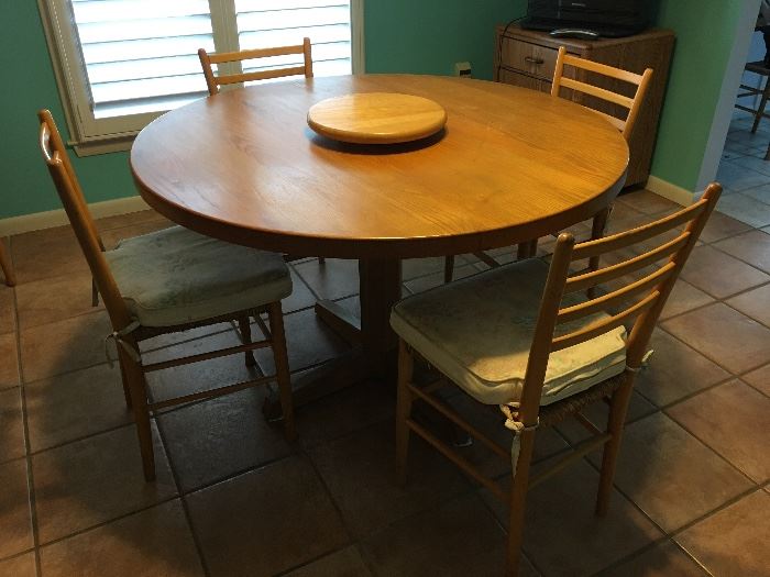 Unbelievable find!  No fake wood or veneers on this solid wood table with 6 chairs and lazy Susan. Pedestal table top is 1.5" thick. Beautiful. 
