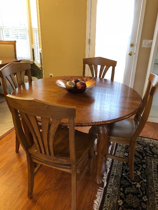 Hand Crafted, Oak Dining Room Table with 3 leaves, (Oval/Round), 6 light wood Dining Chairs