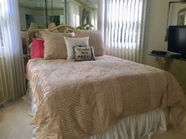 Queen-size duvet cover, shams, pillows, brass headboard for sale.  Other items pictured not for sale.