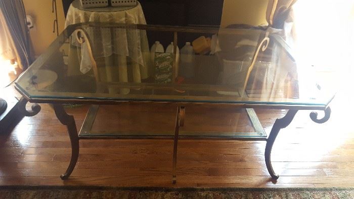 $80    Glass table with gold trim metal base  measures 38" x 56"