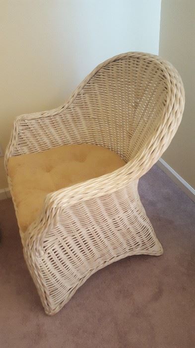 $60   White wicker chair and cushion