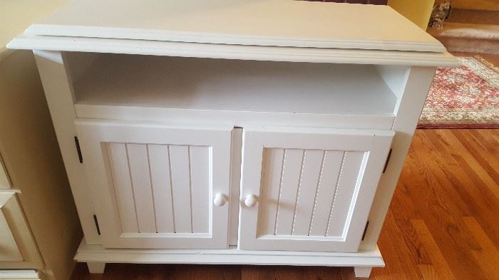 $75   white media cabinet with swivel top measures 38" x 18"