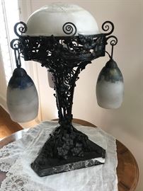 Antique lamp (ornate iron base with marble shades)