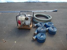4 INCH TRASH PUMP 300FT OF GOODYEAR HOSE 