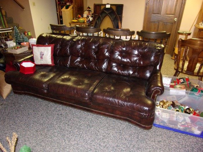 Wonderful leather sofa, chair, loveseat, and ottoman.