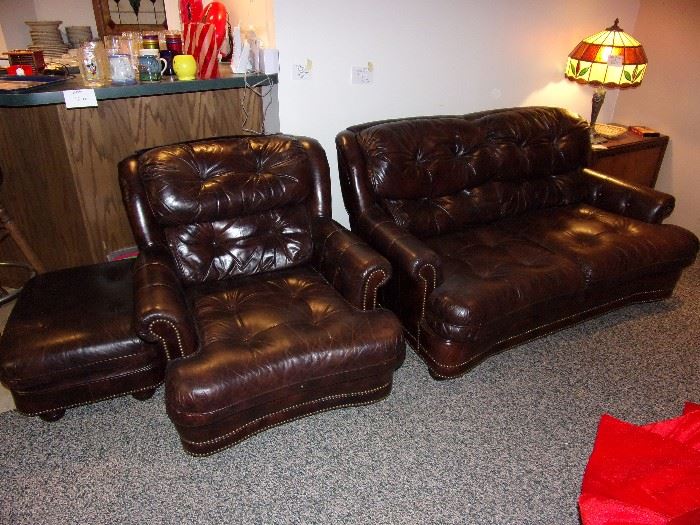 Wonderful leather sofa, chair, loveseat, and ottoman.