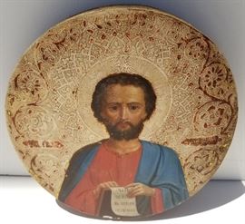 Round Antique Orthodox Christian Scribe Icon
Christ, Apostle or other Saint with Holy Scripture, the Bible verse or letter with visible Greek or Russian text, additionally inscribed middle left and middle right. Tondo format with incised and gilt background, 9.75 inches diameter on a 1 inch thick wooden panel, 1.5 inches deep overall object dimension, unframed.
