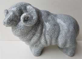 Lg Artist Signed Papers Chinese Crackle Ram
Porcelain glazed statue by artist of Jingdezhen, Jiangxi with artist ink signature and red stamp in booklet with affixed photograph of maker modeling an unglazed ram, artist raised signature seal on side of leg, additionally stamped twice with underside of each foot impressed apparently six character boxed mark (partially illegible or indistinct), Republic era.
12 x 9 x 6 inches, booklet 5.75 x 4 x 0.5 inches closed.